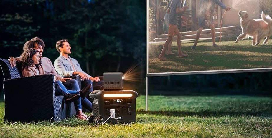 Anker F2600 power station powering an outdoor movie night with a projector, supplied by UPS Equip.