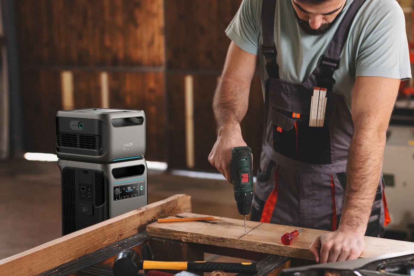 Man drilling wood in workshop powered by Anker portable power station