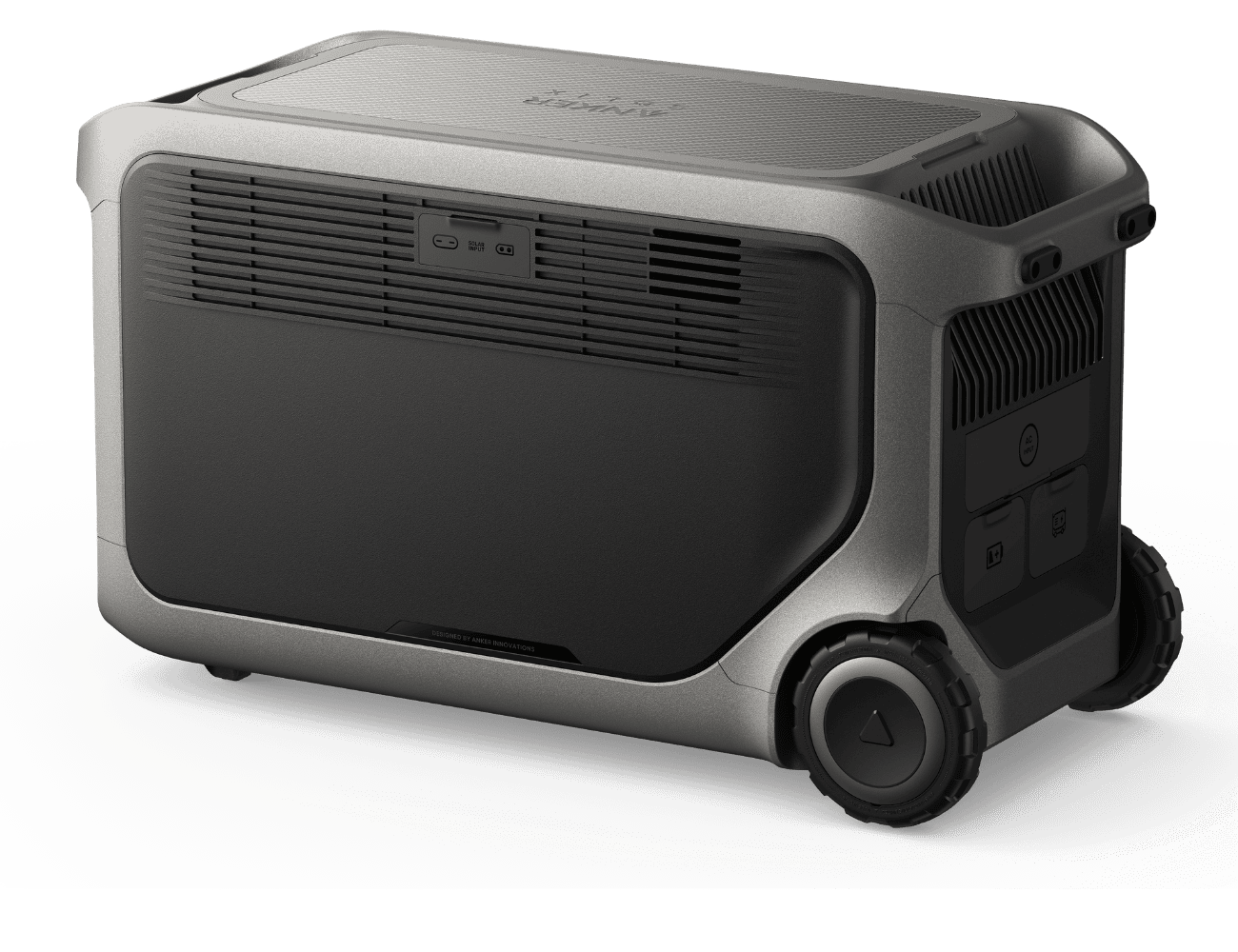 Showing the rear angle of the Anker SOLIX F3000 portable power station with solar input ports, rear AC outlets, ventilation panels, integrated wheels and rugged housing.